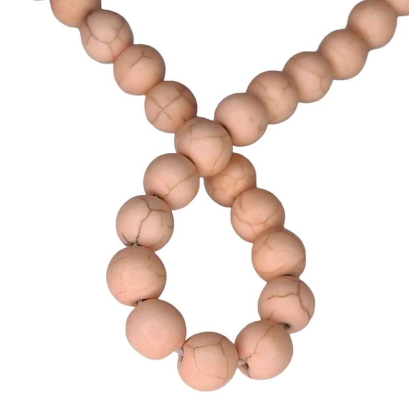 Colored Howlite bead string, light salmon, round, 8mm, 40cm