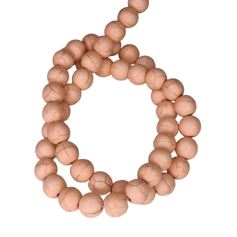 Colored Howlite bead string, light salmon, round, 8mm, 40cm