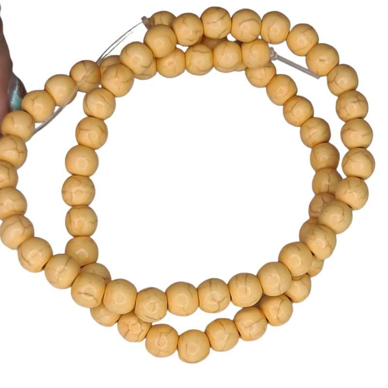 Colored Howlite bead string, light orange, round, 4mm, 40cm