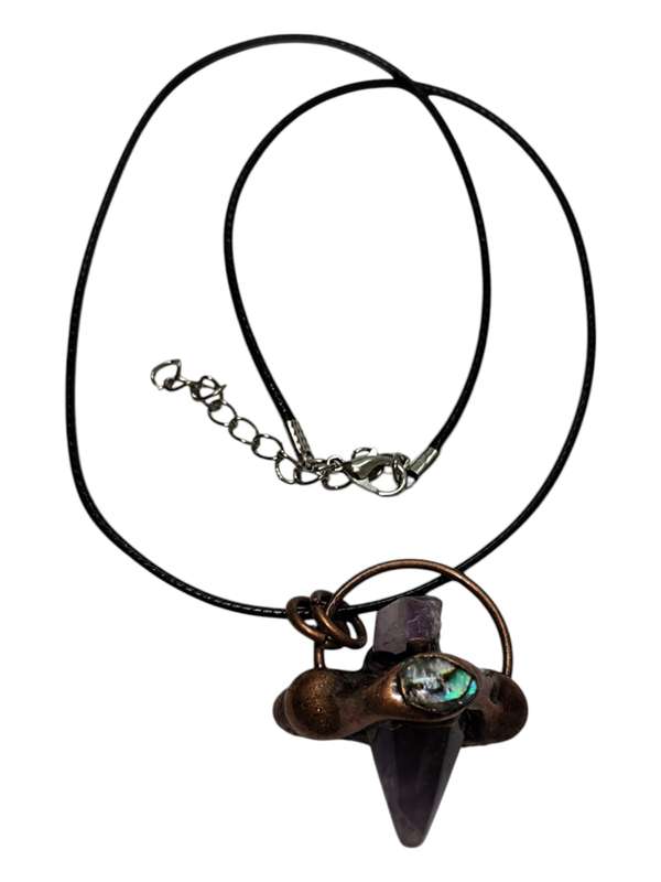 Amethyst pendulum point necklace decorated with paua shell and amethyst piece on the copper color...