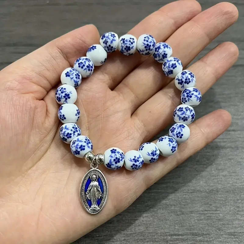 Porcelain Bracelet with delicate blue flowers and Miraculous Medal with blue inlay
