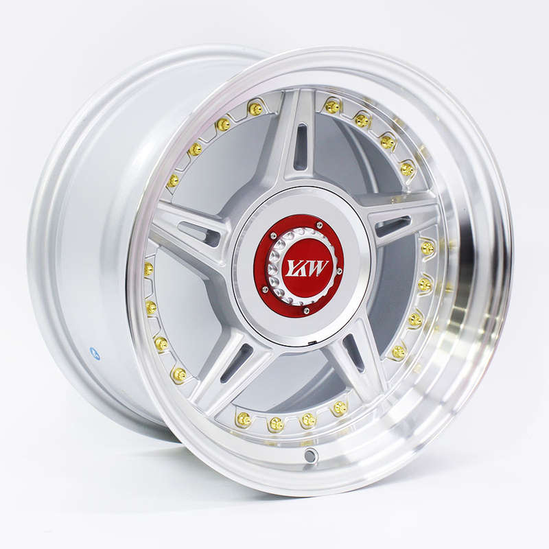 15" CW 5663 4/100 &amp; 4/114 Silver &amp; Gold Stud Alloy Wheels