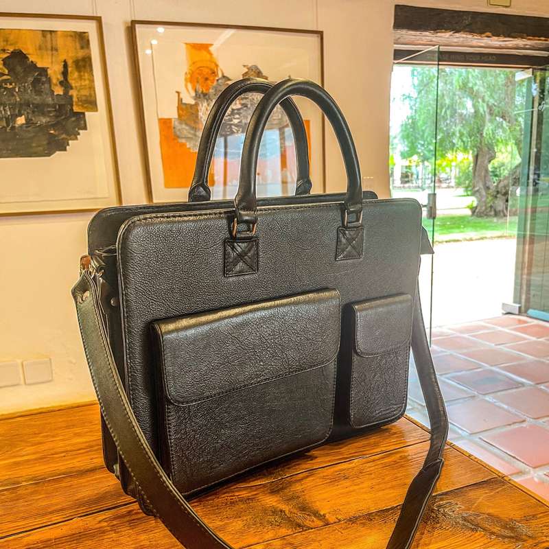 Rainmaker leather laptop bag (production time- 15 days)