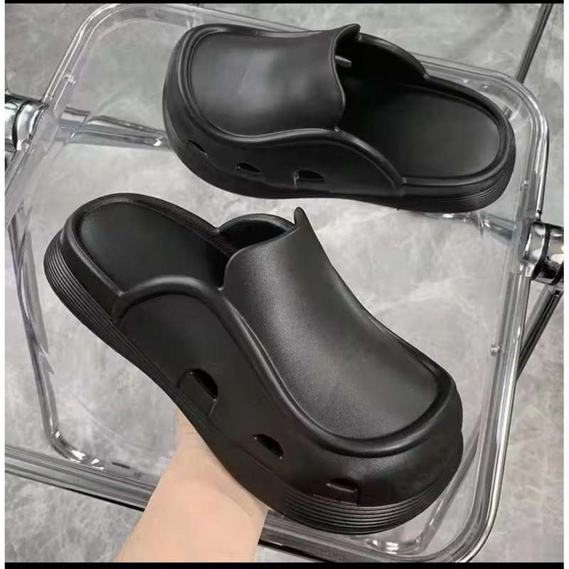 Thick bottom closed toe porous shoes.