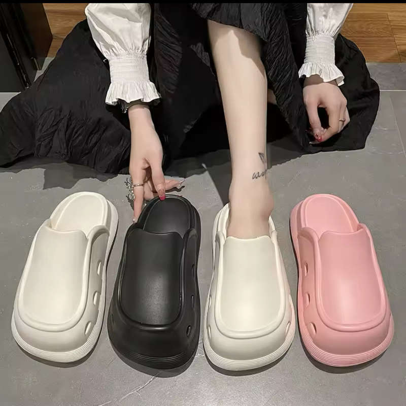 Thick bottom closed toe porous shoes.