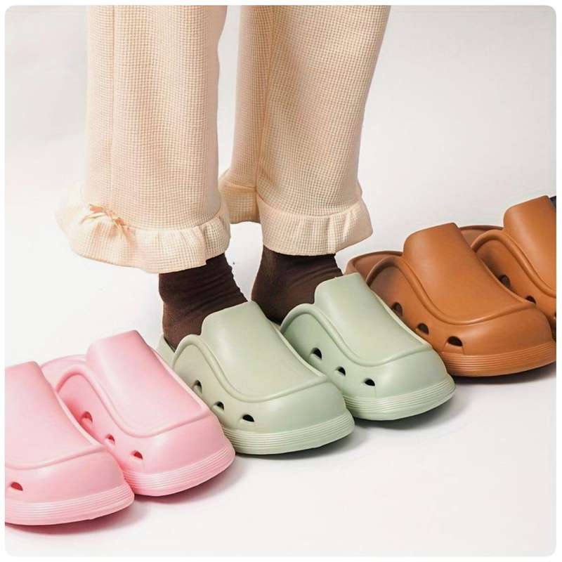 Thick bottom closed toe porous shoes.
