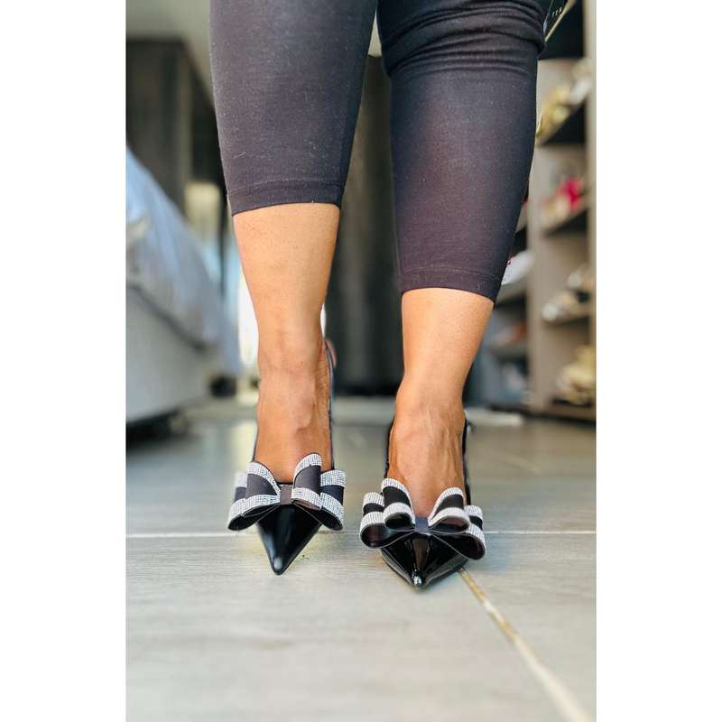 Pointy cross bow stiletto heel