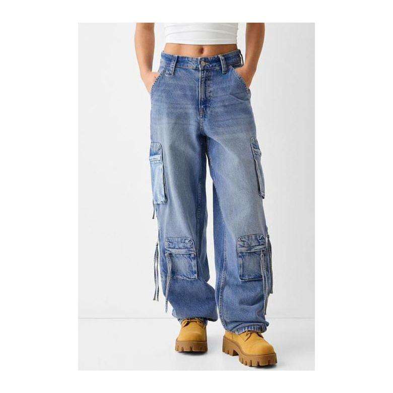 Denim baggy cargo jeans with straps.
