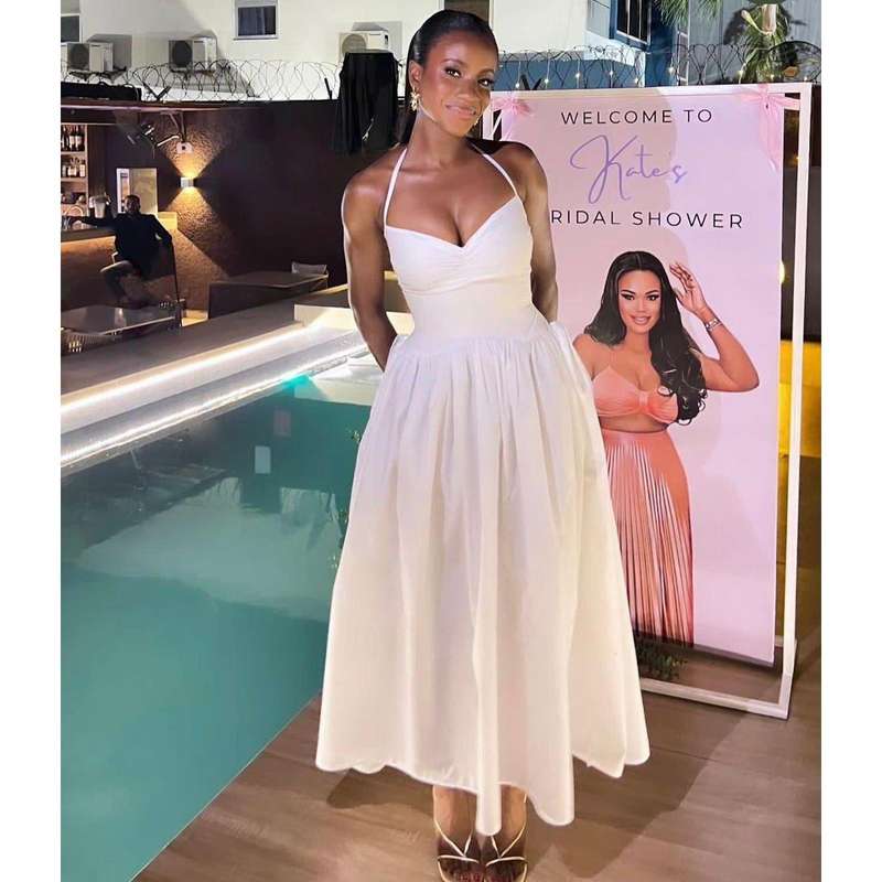Spaghetti strap Lace Up Midi Dress.