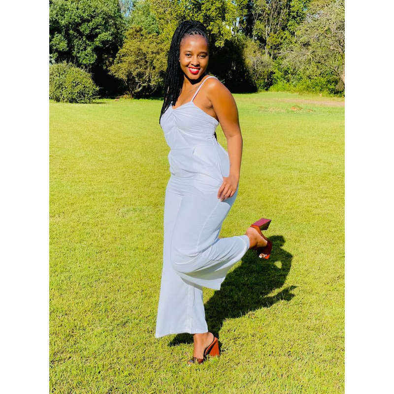 Asymmetrical off-the-shoulder twisted jumpsuit.