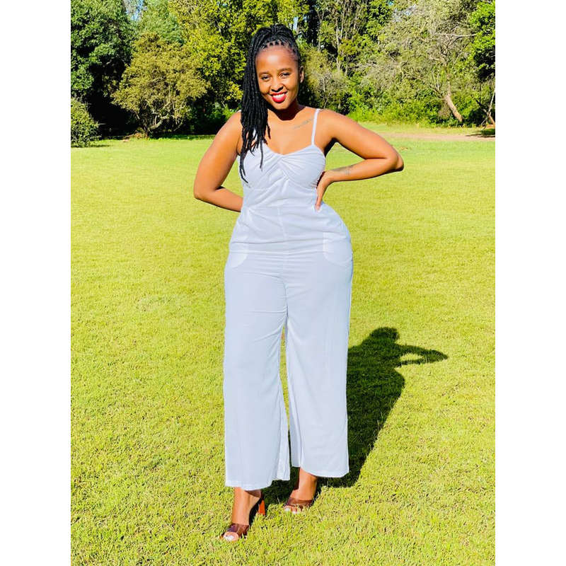 Asymmetrical off-the-shoulder twisted jumpsuit.
