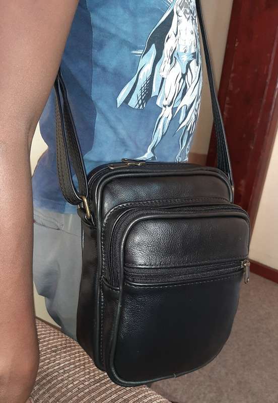 Funypack leather  bags - Black with straight sling.