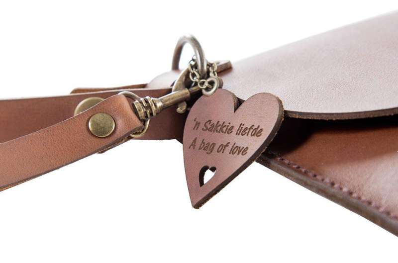 Yuppie Gift Baskets Heart Design Leather Clutch Handbag | Brown
