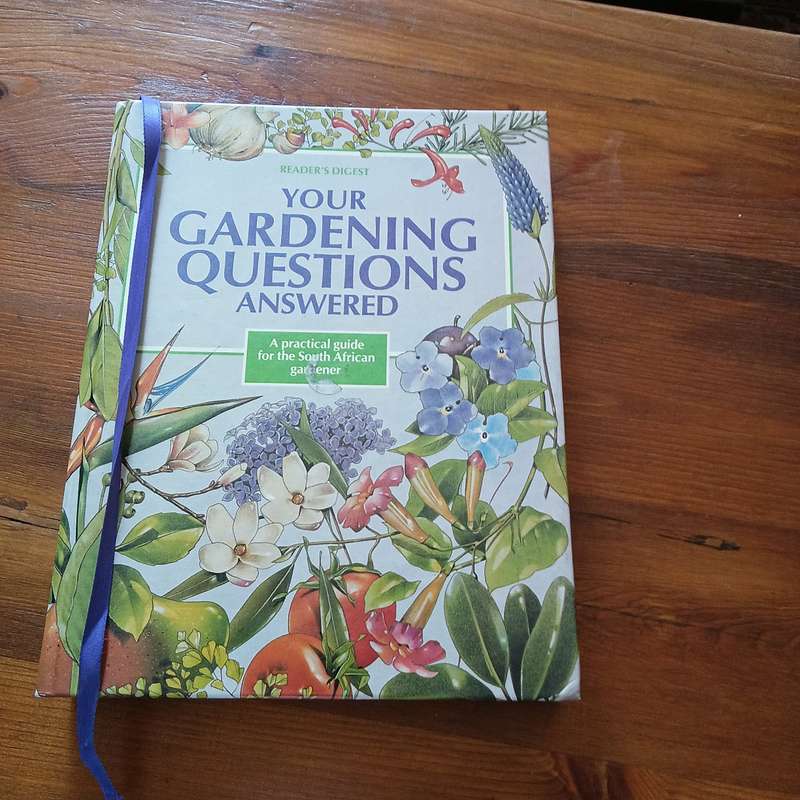 Your Gardening Questions Answered (Reader's Digest)