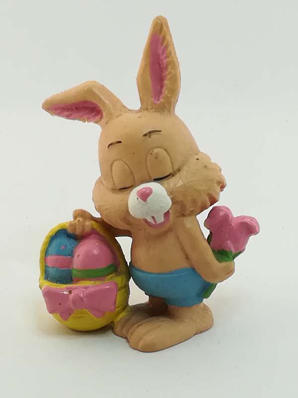 Small Bunny Rabbit Holding Easter Eggs in Basket