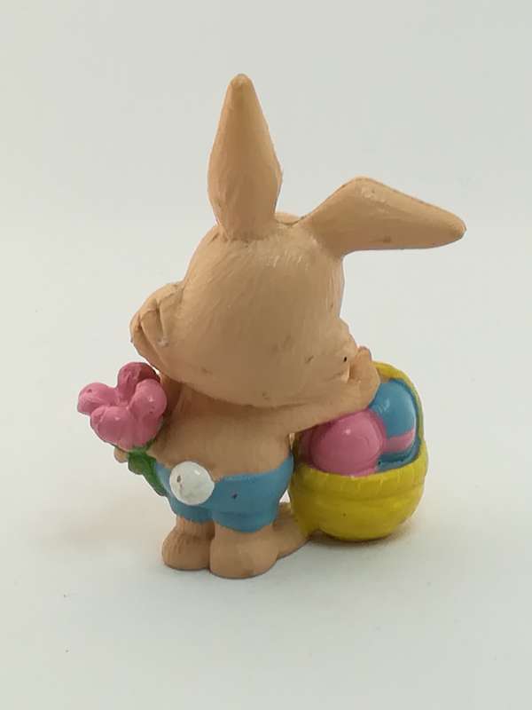 Small Bunny Rabbit Holding Easter Eggs in Basket
