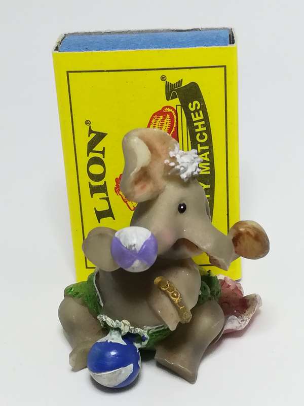 Miniature Elephant Dressed in Green & Pink Attire Playing Catch (Miniature, suitable for printer'...