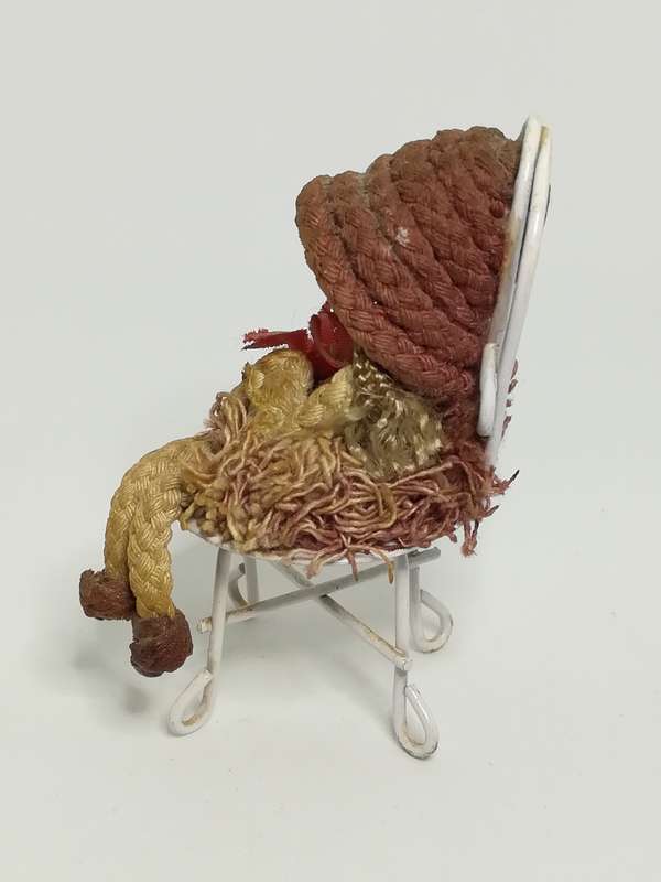 Small Wooden Brown Doll on Chair