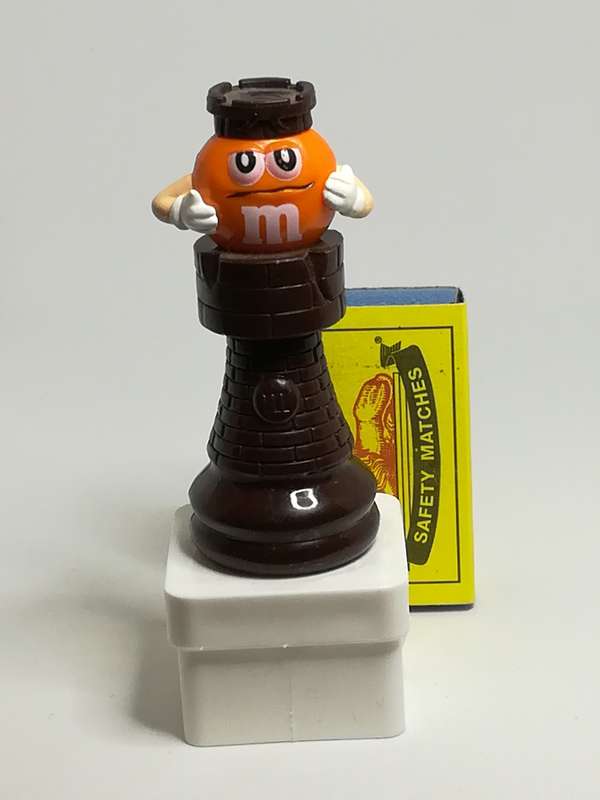 Small Orange, Dark Brown & White M&M
