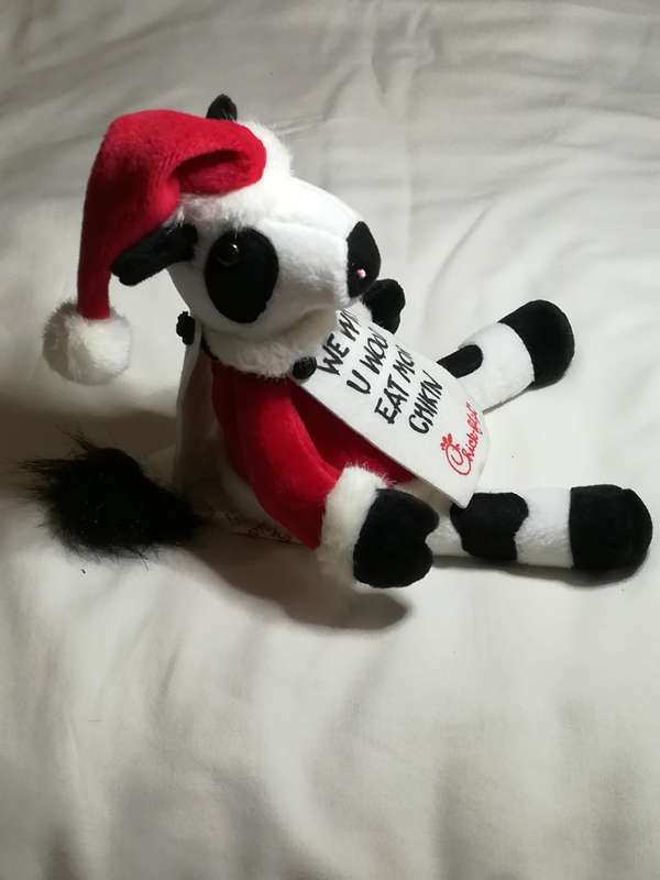 Black & White Cow Dressed in Father Christmas Suit