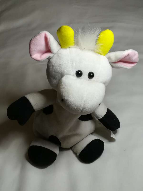 Black & White Pillow Cow with Red Ribbon