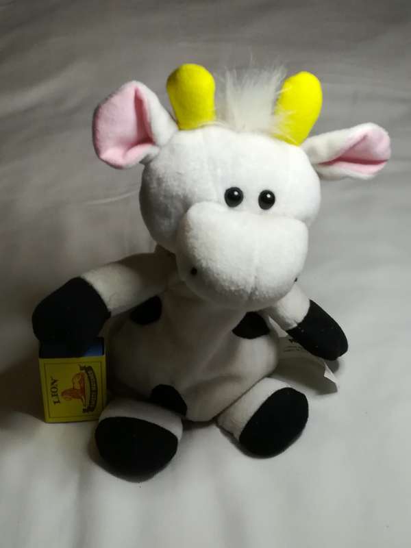 Black & White Pillow Cow with Red Ribbon
