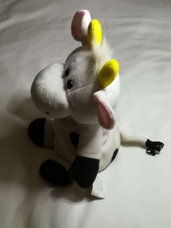 Black & White Pillow Cow with Red Ribbon