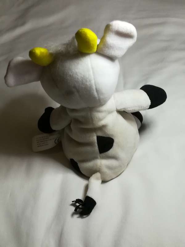 Black & White Pillow Cow with Red Ribbon