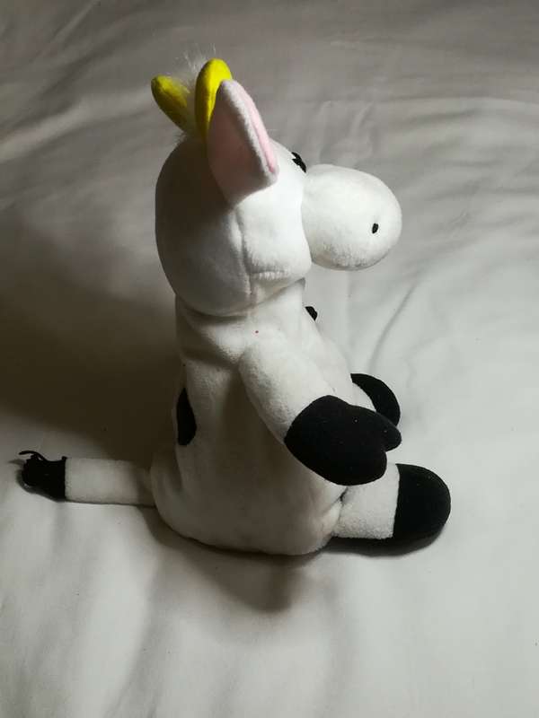 Black & White Pillow Cow with Red Ribbon