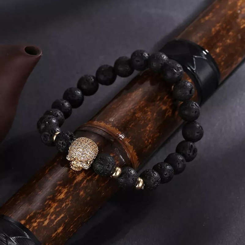 Argent Craft Lava Stone And Fallen Skull Bracelet (gold)