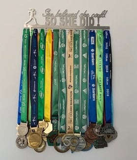 She Believed she could so she did running 48 tier medal hanger