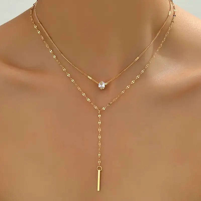Multi Layered Gold Tone Necklace with White Gemstone