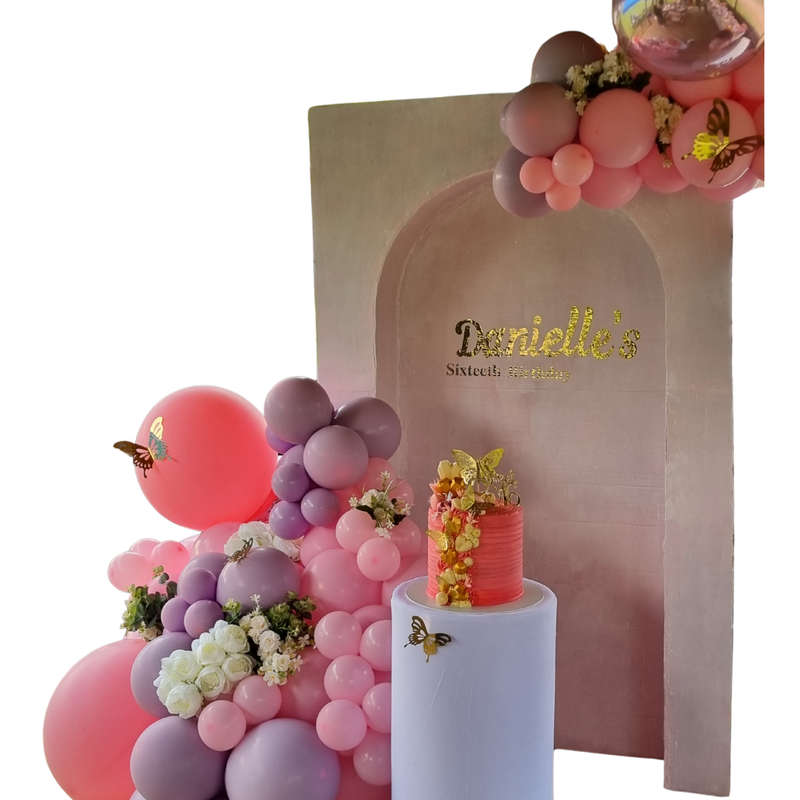 BUTTERFLY AND FLOWER Inverted Chiara Backdrop with Organic Balloon Garland and Plinth