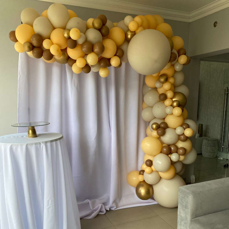 Rectangular Backdrop with Balloon Garland and Cocktail Table