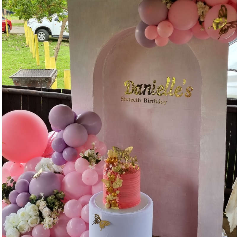BUTTERFLY AND FLOWER Inverted Chiara Backdrop with Organic Balloon Garland and Plinth