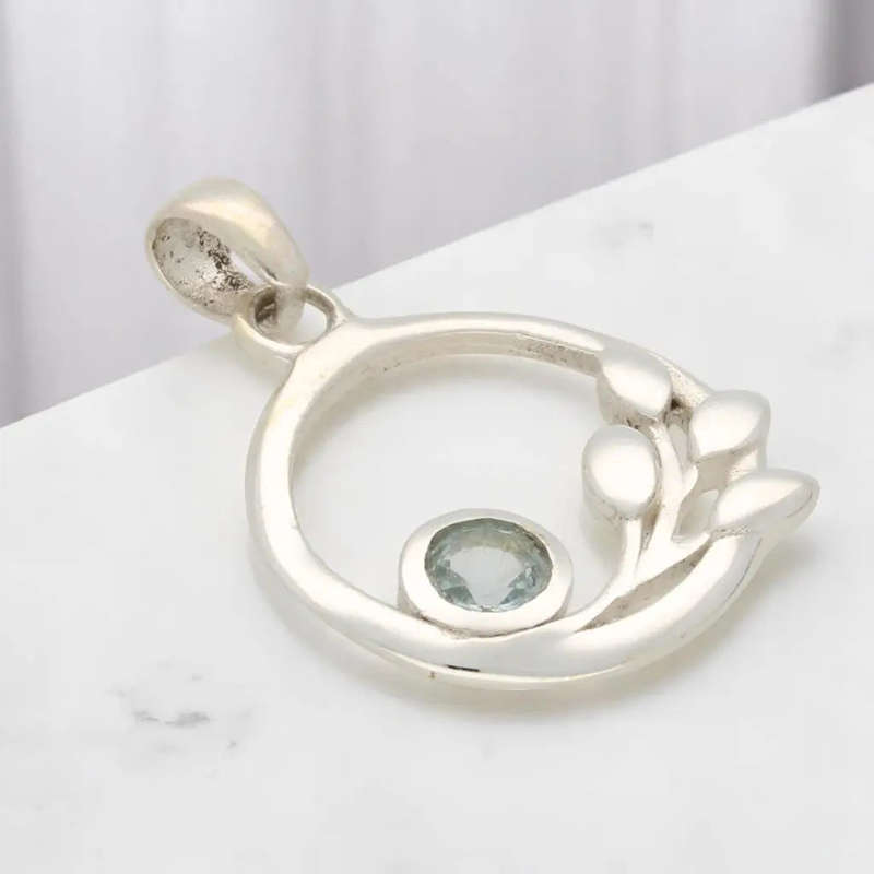 Delicate Blue Topaz Sterling Silver Pendant