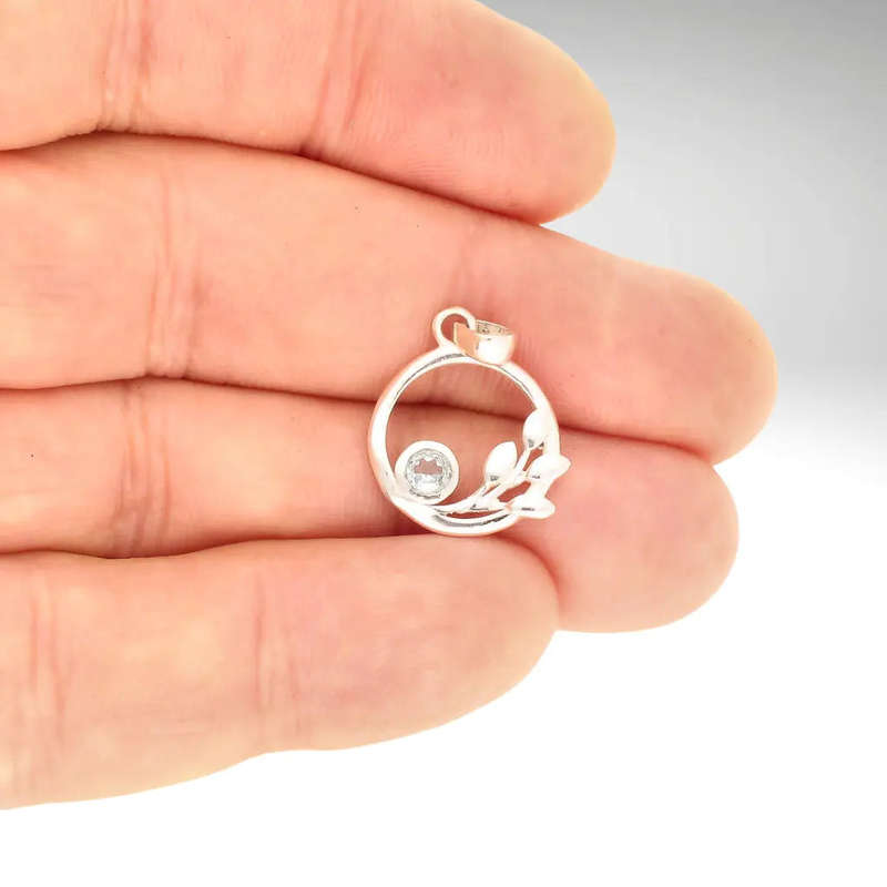 Delicate Blue Topaz Sterling Silver Pendant
