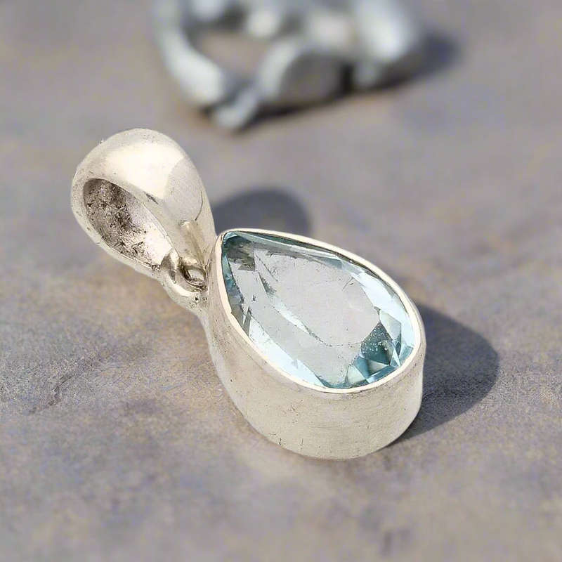 Graceful Blue Topaz Teardrop in Sterling Silver