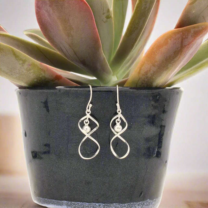Twist & Shout: Modern Sterling Silver Double Twist Dangle Earrings!