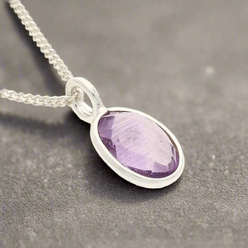 Guardian Glow: Faceted Oval Amethyst Necklac