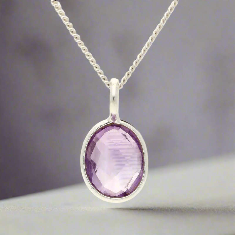 Guardian Glow: Faceted Oval Amethyst Necklac