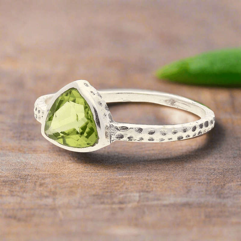 Peridot Radiance: Trillion Spark Sterling Silver Ring