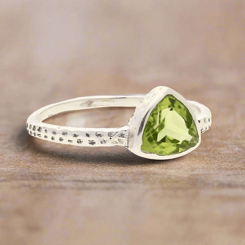 Peridot Radiance: Trillion Spark Sterling Silver Ring