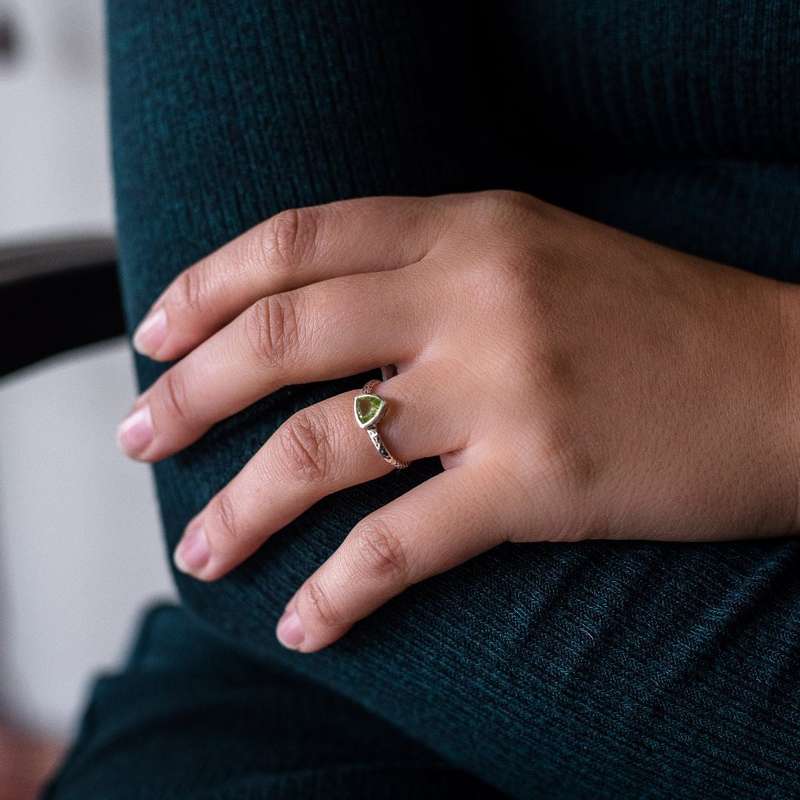 Peridot Radiance: Trillion Spark Sterling Silver Ring