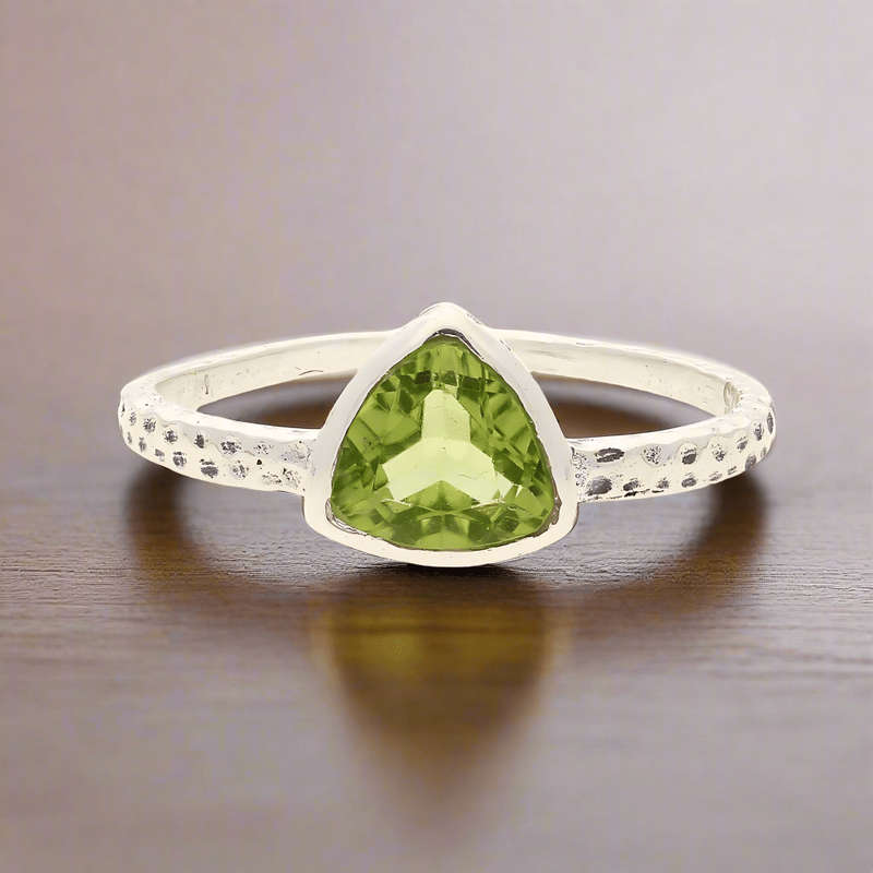 Peridot Radiance: Trillion Spark Sterling Silver Ring