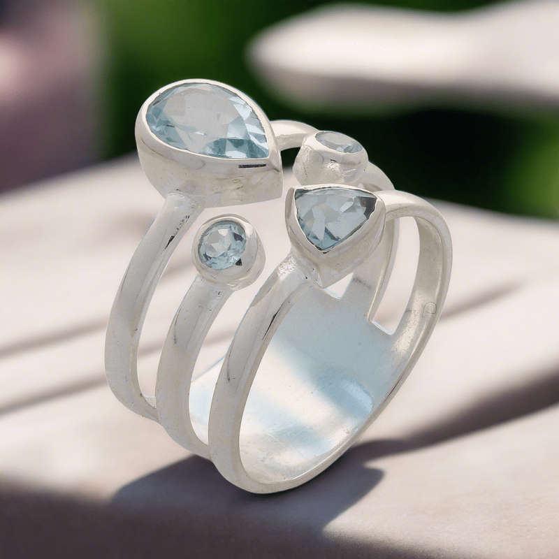 Triple Band Sterling Silver Ring with Cascading Blue Topaz Quartet