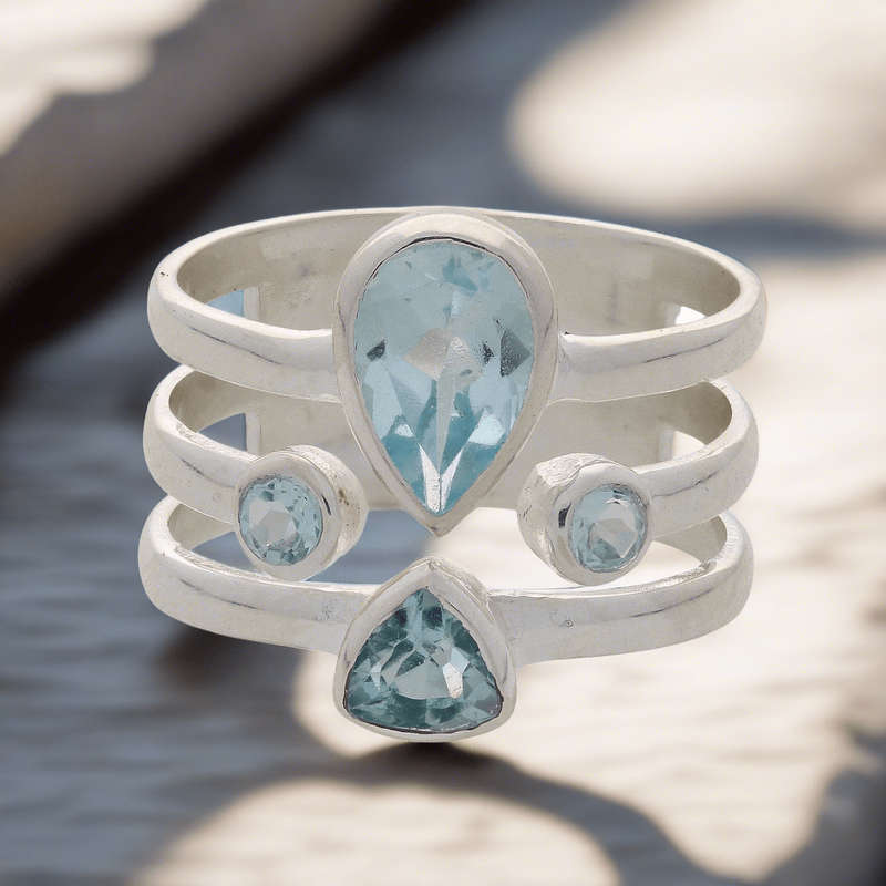 Triple Band Sterling Silver Ring with Cascading Blue Topaz Quartet
