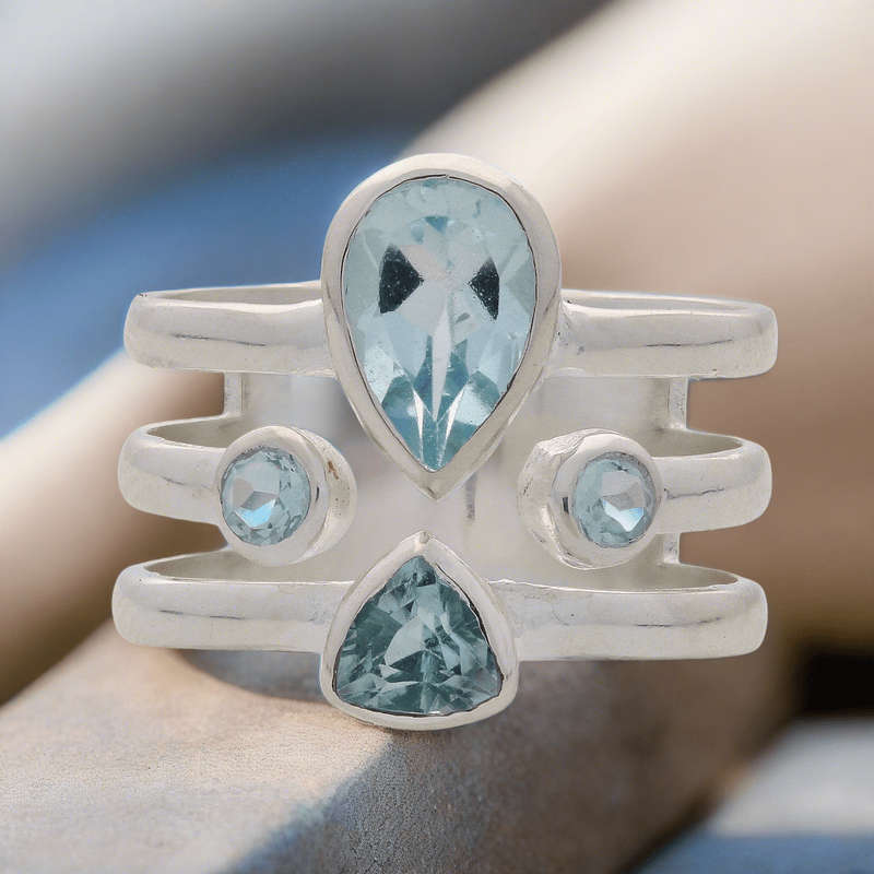 Triple Band Sterling Silver Ring with Cascading Blue Topaz Quartet
