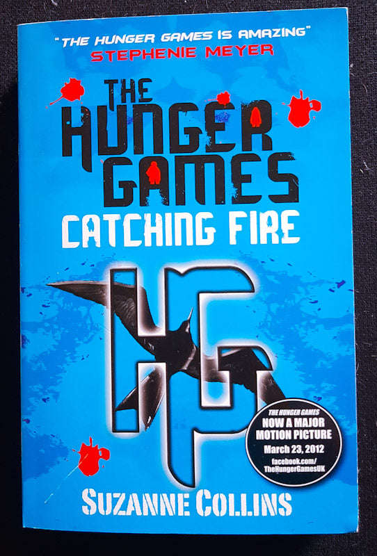 Catching Fire (The Hunger Games #2) (Suzanne Collins)