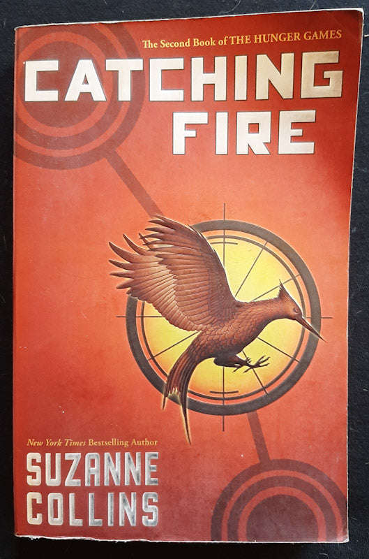 Catching Fire (The Hunger Games #2) (Suzanne Collins)